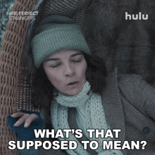 an advertisement for nine perfect strangers shows a woman laying in a wicker chair