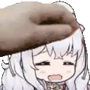 a person is petting a cartoon character 's head with their hand .