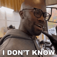 a man with glasses says i don t know