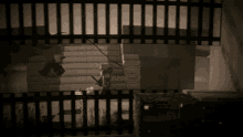 a black and white photo of a minecraft character behind bars
