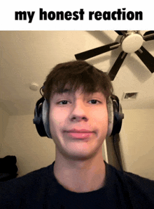 a man wearing headphones with the words my honest reaction below him