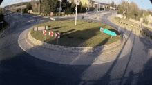 a roundabout with a sign in the middle that says zagorska