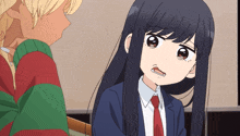 a girl with long black hair and a red tie looks at the camera