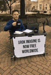 elon musk is sitting at a table with a sign that says grok imagine is now free worldwide