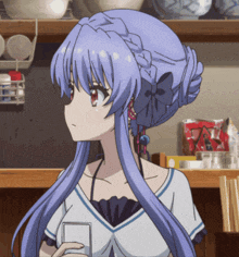 a girl with blue hair is holding a glass of water
