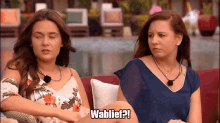 two women are sitting on a couch and one of them is saying wablief !
