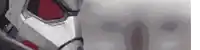a close up of a robot 's face with a red spot on it