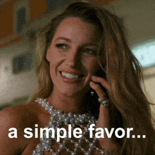 a woman in a pearl dress is smiling and talking on a cell phone with the words " a simple favor " below her
