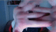 a blurry picture of a person 's face with their mouth open