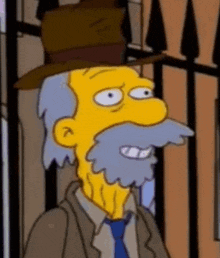 a cartoon character with a beard and a hat is smiling .