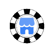 a black and white poker chip with a blue castle inside of it