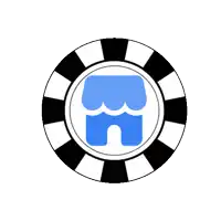 a black and white poker chip with a blue castle inside of it