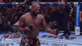 a man in a boxing ring with a banner for better.com