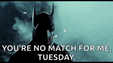 a close up of a batman saying `` you 're no match for me tuesday '' .