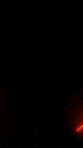 a large letter u is surrounded by red rays of light