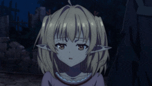 a girl with blonde hair and elf ears looks very sad