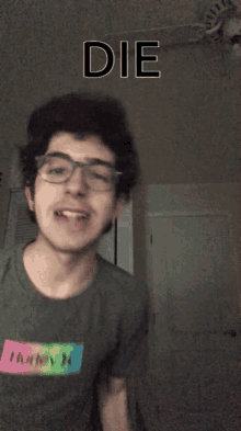 a man wearing glasses and a shirt that says hurley on it makes a funny face