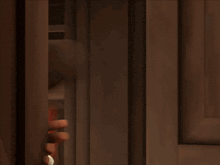 a man wearing an orange hard hat has a wrench on his sleeve