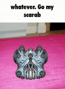 a picture of a robot that says whatever go my scarab on it