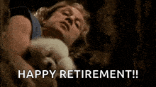 a man is sleeping with a small white dog and the words `` happy retirement '' are written below him .
