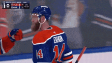 a hockey player with the number 14 on his jersey stands on the ice