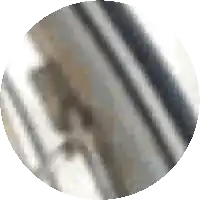 a blurry picture of a person 's face in a circle on a white background