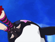 a cartoon character is riding on the back of a killer whale