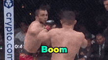 two men are fighting in a boxing ring and the word boom is on the bottom of the screen .