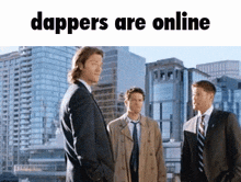 three men in suits and ties are standing next to each other in front of a city skyline and the words dappers are online above them
