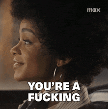 a woman says " you 're a fucking " in a car