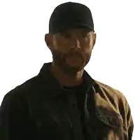 a man wearing a hat and a jacket says " no shit "