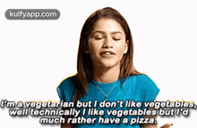 a woman in a blue shirt is saying that she is a vegetarian but she does n't like vegetables .