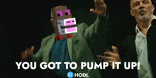 a man in a suit is dancing with the words " you got to pump it up " below him