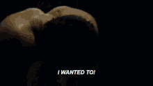 a shirtless man is screaming and saying `` i wanted to '' in a dark room .