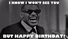 a man wearing sunglasses and a tuxedo says " i know i won 't see you but happy birthday ! "