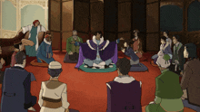 a group of people are sitting around a man in a purple robe