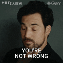 a man with a beard says you 're not wrong with his eyes closed