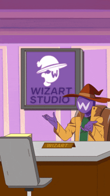 a wizard sits at a desk in front of a sign that says wizart studio