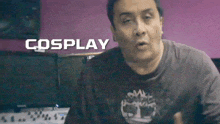 a man wearing a timberland shirt is making a funny face