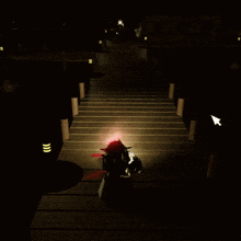 a red light is shining on a wooden table in a dark room