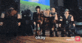a group of cartoon characters are standing next to each other and one of them is saying " okay "