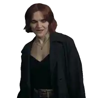 a woman with red hair is wearing a black coat and black top