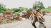 a blurred image of a person in a costume walking