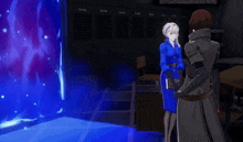 a woman in a blue dress is covering her face while standing next to a man in a black coat