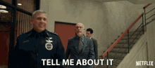 a netflix ad shows two men walking down stairs