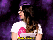 a woman wearing a shirt that says be kind to all