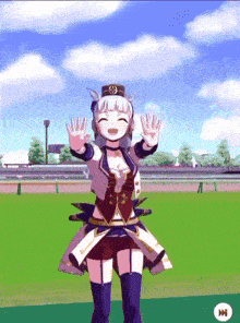 a girl in a dress is standing in a field with her hands up