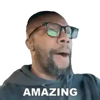 a man wearing glasses and a hoodie says amazing