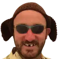 a man with a beard wearing sunglasses and a hat