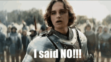 a man in armor says " i said no " in front of a crowd of soldiers